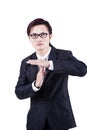 Businessman with time out hand gesture