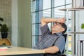 Businessman tired overworked he relaxing with closed eyes Royalty Free Stock Photo