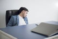 Businessman tired overworked sleeping on office desk