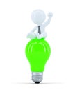 Businessman on top of the green bulb. Business idea concept