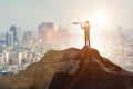 Businessman at the top of mountain in career concept Royalty Free Stock Photo