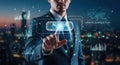Businessman touches digital screen with achieve button and data visualizations Royalty Free Stock Photo