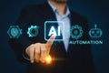 Businessman touching AI, activating artificial intelligence and industrial automation technology. Royalty Free Stock Photo