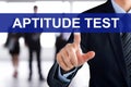 Businessman touching APTITUDE TEST tab on virtual screen Royalty Free Stock Photo