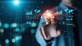Businessman Touching Digital Screen with Business Analytics and Data Visualization Royalty Free Stock Photo