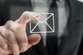 Businessman touching email icon Royalty Free Stock Photo