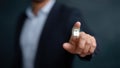 Businessman touching glowing padlock icon, symbolizing cybersecurity, digital data protection, privacy, secure network access, and Royalty Free Stock Photo