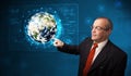 Businessman touching high-tech 3d earth panel Royalty Free Stock Photo