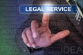 Businessman touching legal service button on virtual screen