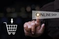 Businessman touching online shop button. e-commerce business online concept
