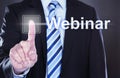 Businessman Pressing Webinar Button Royalty Free Stock Photo