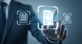 Businessman touching virtual document icon representing digital file management and data organization on a modern interface for Royalty Free Stock Photo