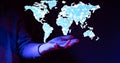 Businessman touching a virtual projection of the global network Royalty Free Stock Photo