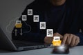 Businessman transfer data or document between smartphone to laptop on cloud internet network