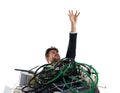 Businessman trapped by cables. concept of stress and overwork