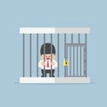 Businessman trapped in a cage