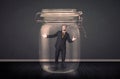 Businessman trapped into a glass jar concept Royalty Free Stock Photo