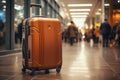 Businessman with trolley suitcase in lobby Royalty Free Stock Photo