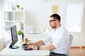 Businessman typing on computer keyboard at office Royalty Free Stock Photo