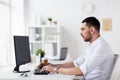 Businessman typing on computer keyboard at office Royalty Free Stock Photo