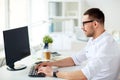 Businessman typing on computer keyboard at office Royalty Free Stock Photo