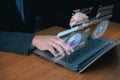 Businessman typing on laptop with virtual screen using generative AI to write code and analyze data charts. Concept of future Royalty Free Stock Photo