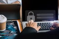 Businessman typing login and password in the concept of cyber security, information security, data protection, and encryption for Royalty Free Stock Photo