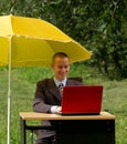 Businessman with umbrella Royalty Free Stock Photo