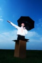 Businessman with umbrella Royalty Free Stock Photo