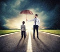 Businessman with umbrella that protect a child. Concept of young economy and startup protection Royalty Free Stock Photo