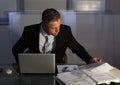Businessman under pressure working overtime Royalty Free Stock Photo