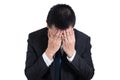 Businessman under stressed with a headache isolated on white background. Disappointed gloomy young man resting his head on hand