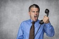 Businessman unloads anger on the employee by phone Royalty Free Stock Photo