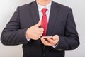 Businessman use smart phone while another hand garentee new smartphone, front view. Business concept Royalty Free Stock Photo