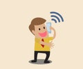Businessman use smart phone with wifi symbol