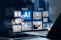 Businessman using AI, Artificial Intelligence with laptop. AI assistant. Chatbot, Generate images, Write code, Writer bot, Data