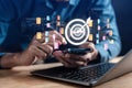 Businessman using ai technology for data analytics marketing target, Artificial Intelligence generated. Futuristic technology in