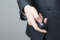 Businessman using car key Royalty Free Stock Photo