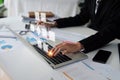 Businessman using a computer analysis for process and workflow automation with flowchart Royalty Free Stock Photo