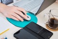 Businessman using computer mouse on work desk. Royalty Free Stock Photo