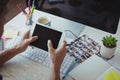 Businessman using digital tablet at creative office desk Royalty Free Stock Photo