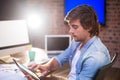 Businessman using digital tablet at desk Royalty Free Stock Photo