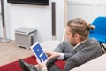 businessman using digital tablet with facebook website