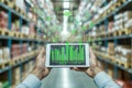 Businessman using digital tablet to manage warehouse with data technology and analytics visuals Royalty Free Stock Photo