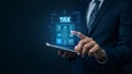 Businessman using digital tax software on a tablet with innovative interface and modern technology Royalty Free Stock Photo