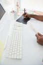 Businessman using digitizer and colour wheel