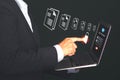 Businessman using finger touch security icon on the virtual screen for unlocking to