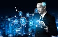 Businessman Using Futuristic Technology to Connect with Digital Network Icons Representing Global Communication and Royalty Free Stock Photo