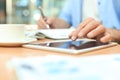 Businessman using his tablet in the office Royalty Free Stock Photo