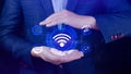 Businessman using holding with wifi icon. Social network business communication concept, Wifi wireless concept free network Royalty Free Stock Photo